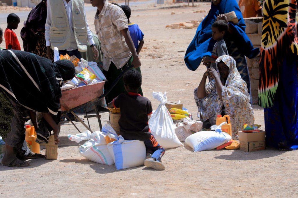 Food sacks and water containers distributed to needy people